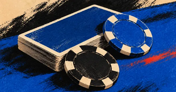 A closed deck of cards and two casino chips on blue felt